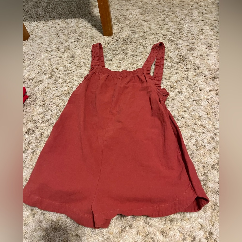Mini red romper out of canvas material